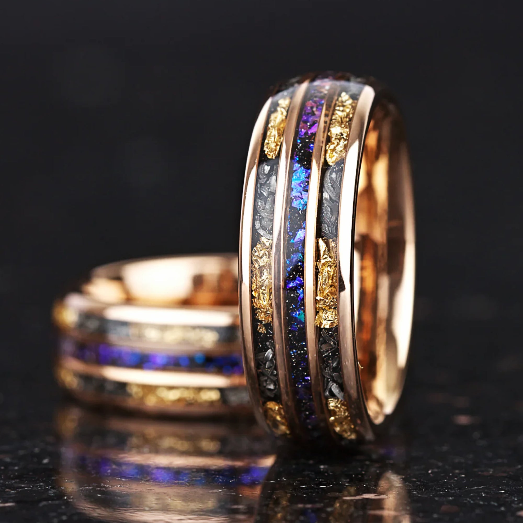 Couple jewellery set featuring meteorite rings with gold and nebula design