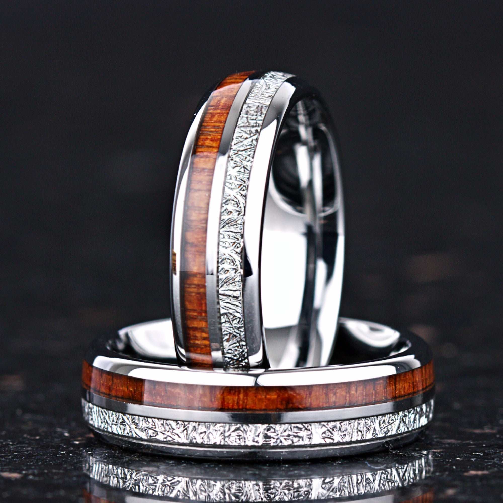 Couple rings jewelry design with layered wood and meteorite style detail