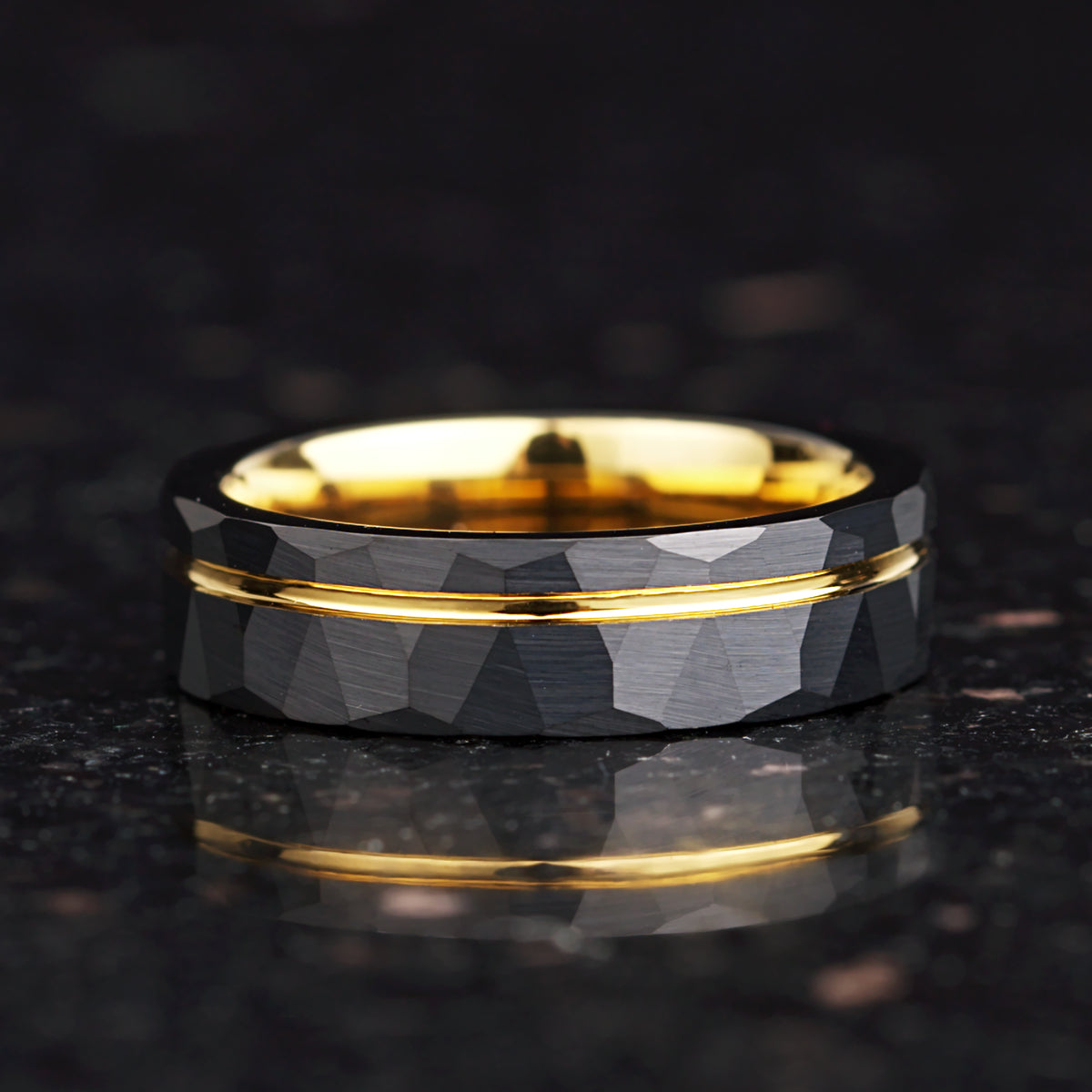 Gold Wedding Band Black Tungsten Showing Reflective Metallic Finish
