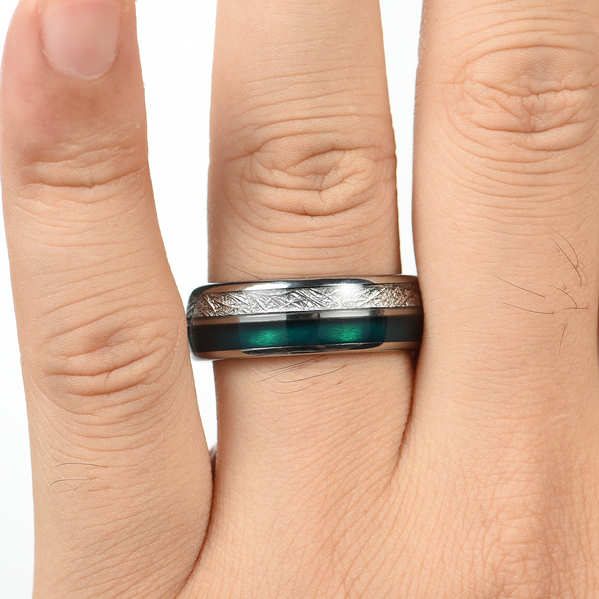 His And Her Wedding Ring Sets On A Male Hand With Silver Band And Green Agate Meteorite Style Inlay