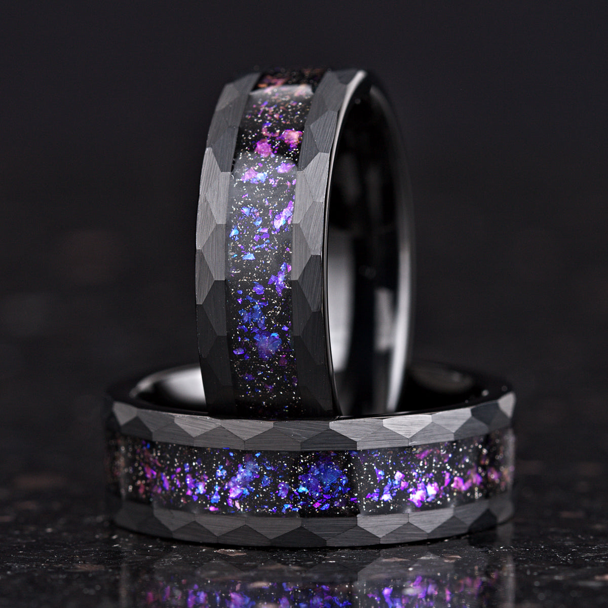 His and Hers Black Tungsten Wedding Rings with Orion Nebula Design Angled View