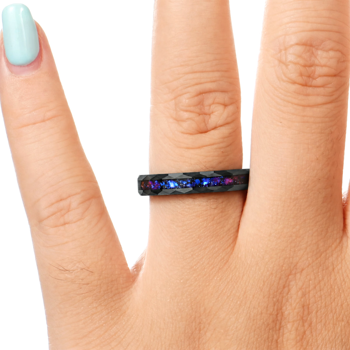 His and Hers Black Tungsten Wedding Rings with Orion Nebula Design Female Hand View