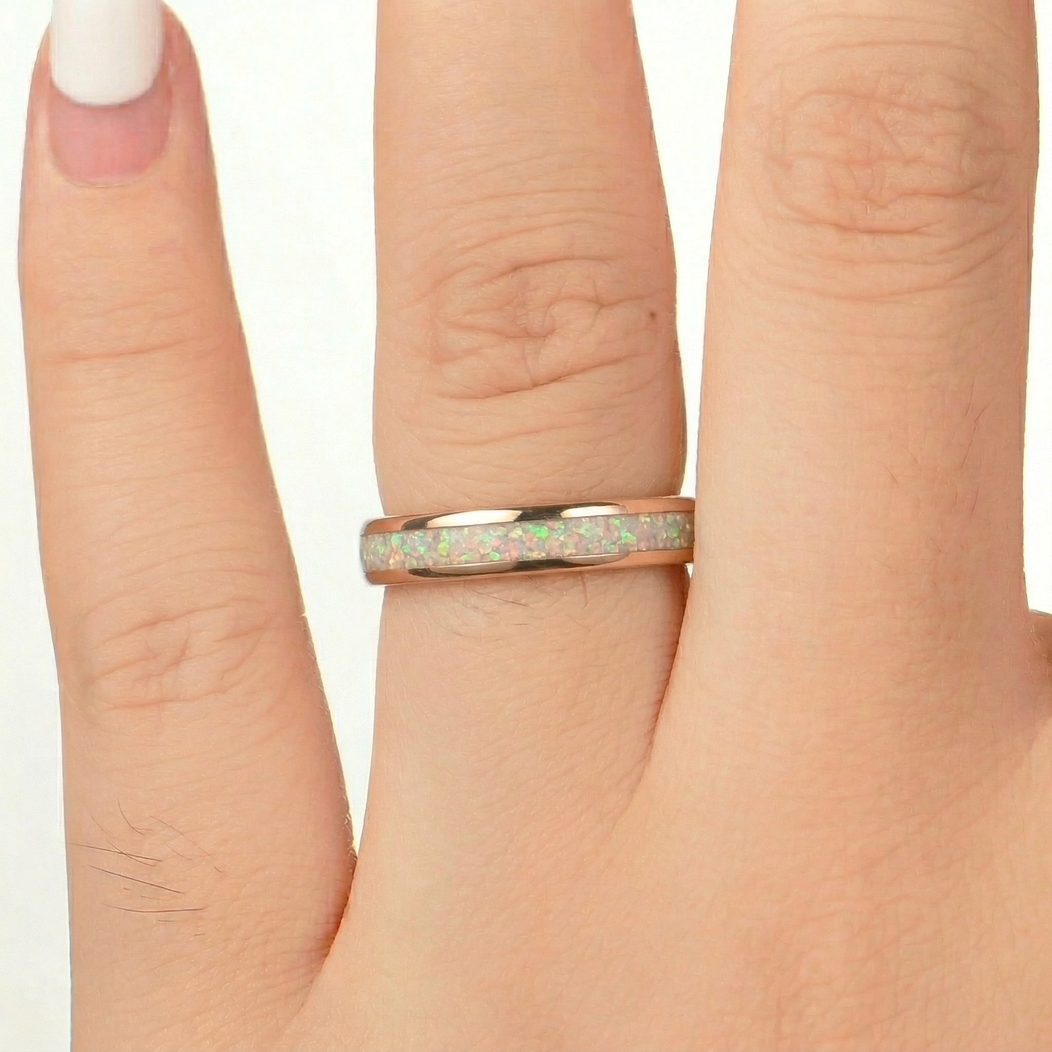 His and Hers Rose Gold Wedding Set with Fire Opal Female Hand View