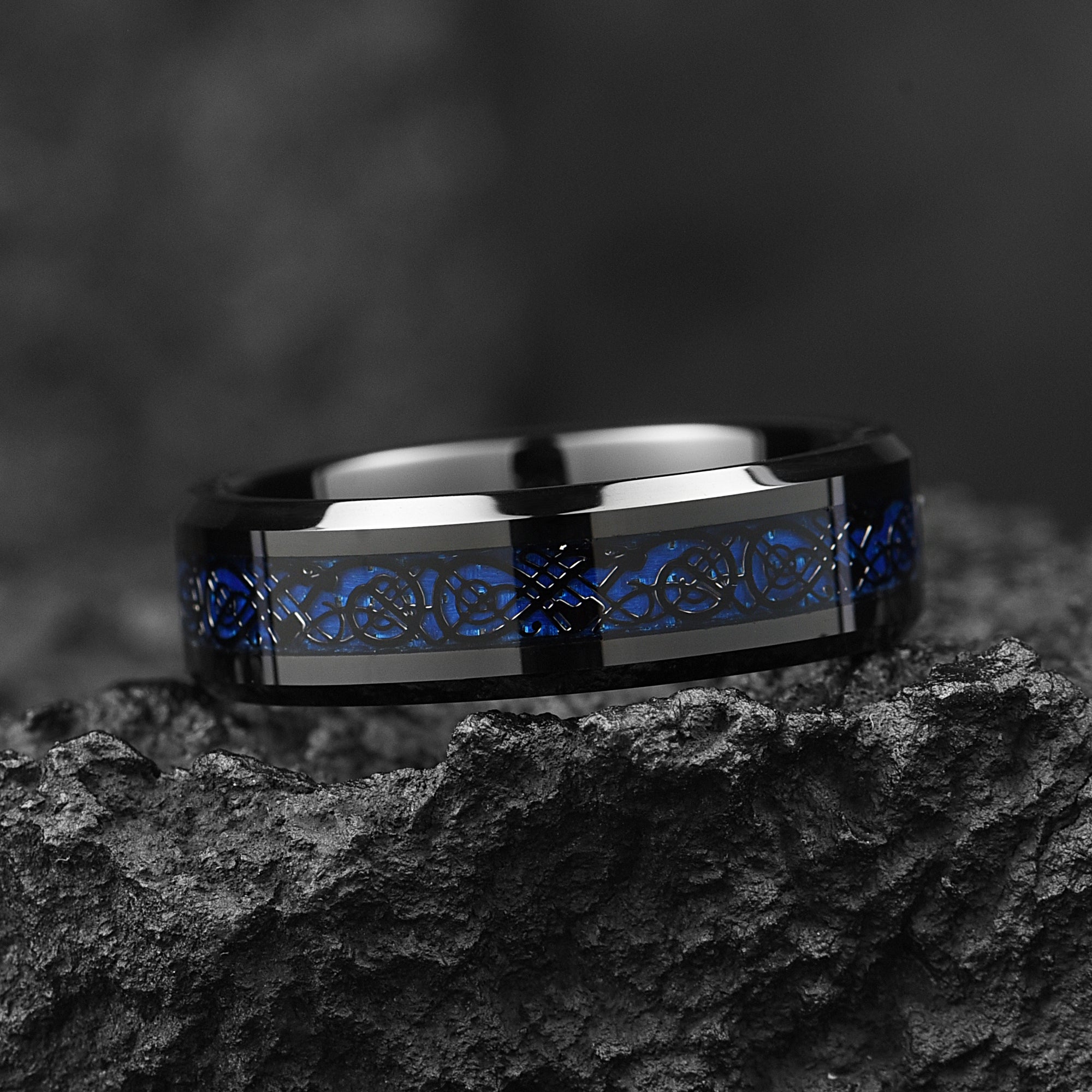 celtic tungsten pattern with blue carbon fibre underneath close detail