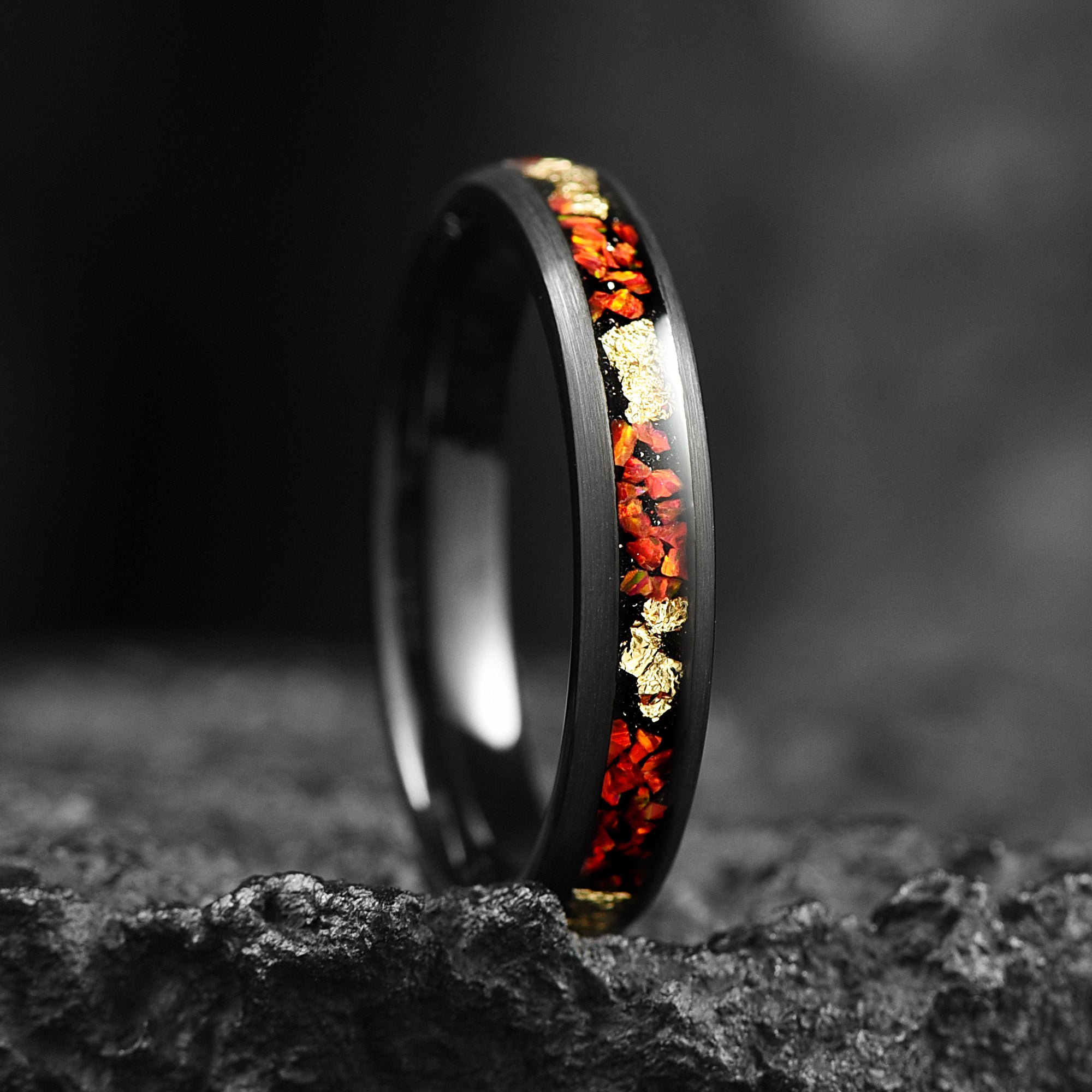 black ladies marriage ring with fire opal angle view