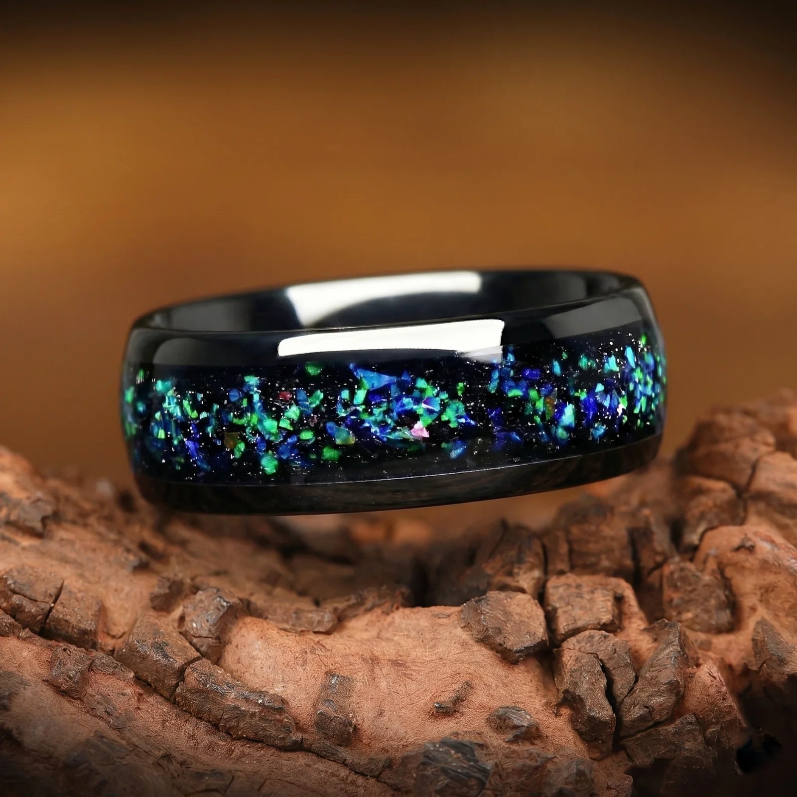 Matching Rings Discount Tungsten Wedding in Helix Nebula Design Close Up View on a Wooden Surface