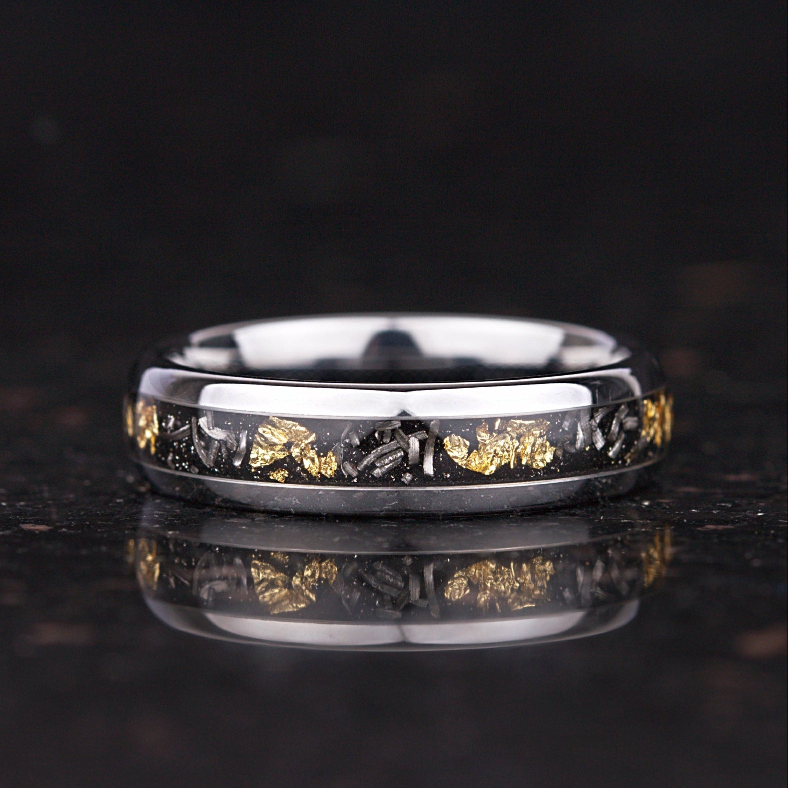 Meteorite wedding ring set showing authentic meteorite texture and polished edges