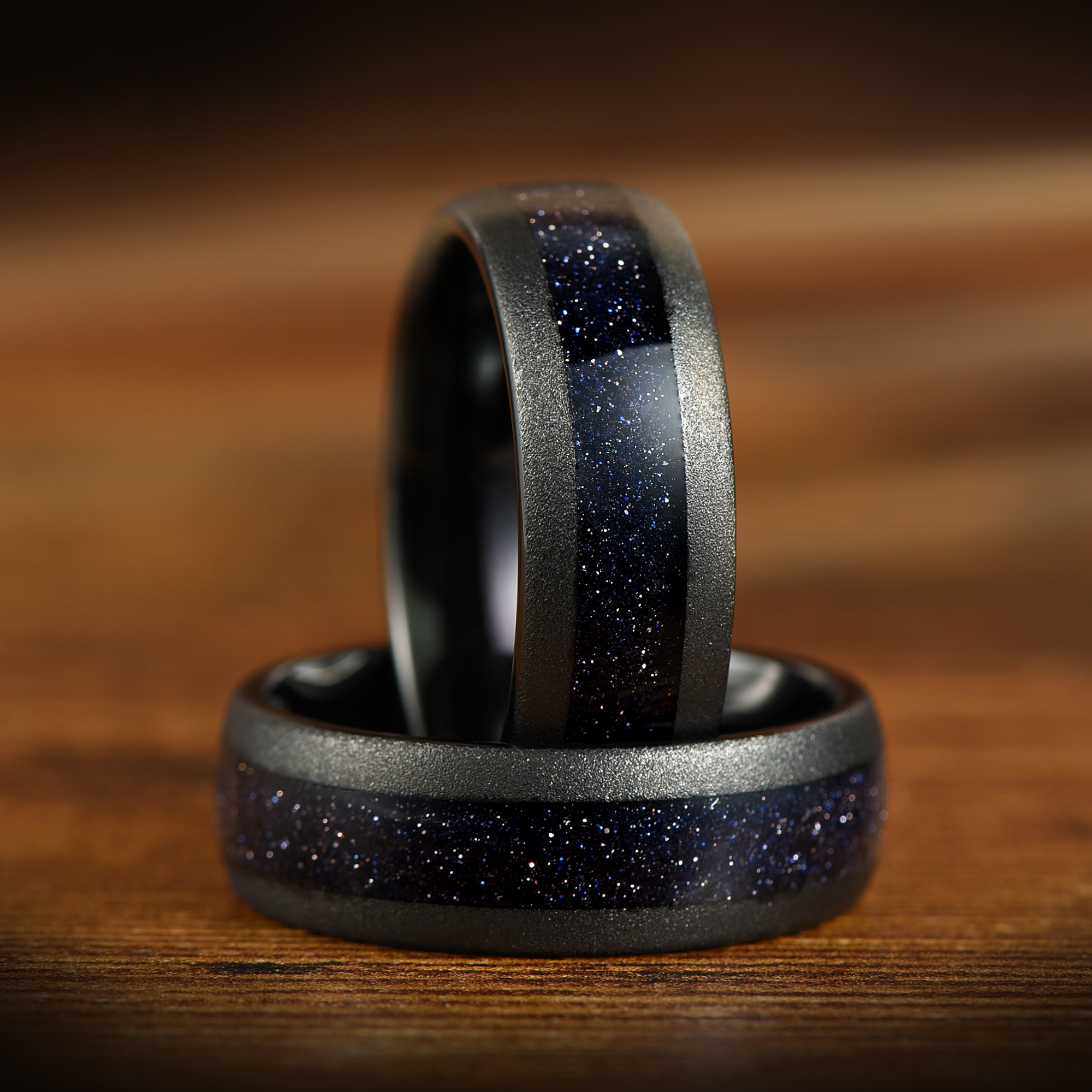Rings set for couple with black tungsten and subtle galaxy effect