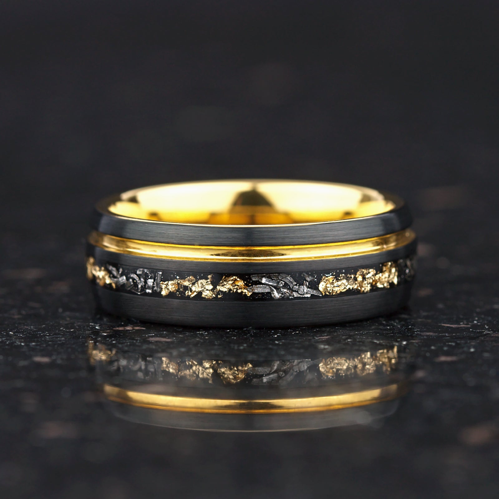 Tungsten ring showing meteorite inlay and gold leaf close up