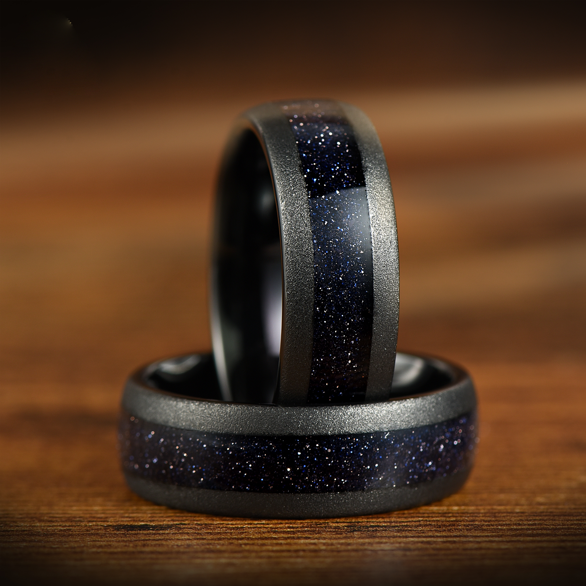Unique wedding ring for him with black tungsten and nebula style detail