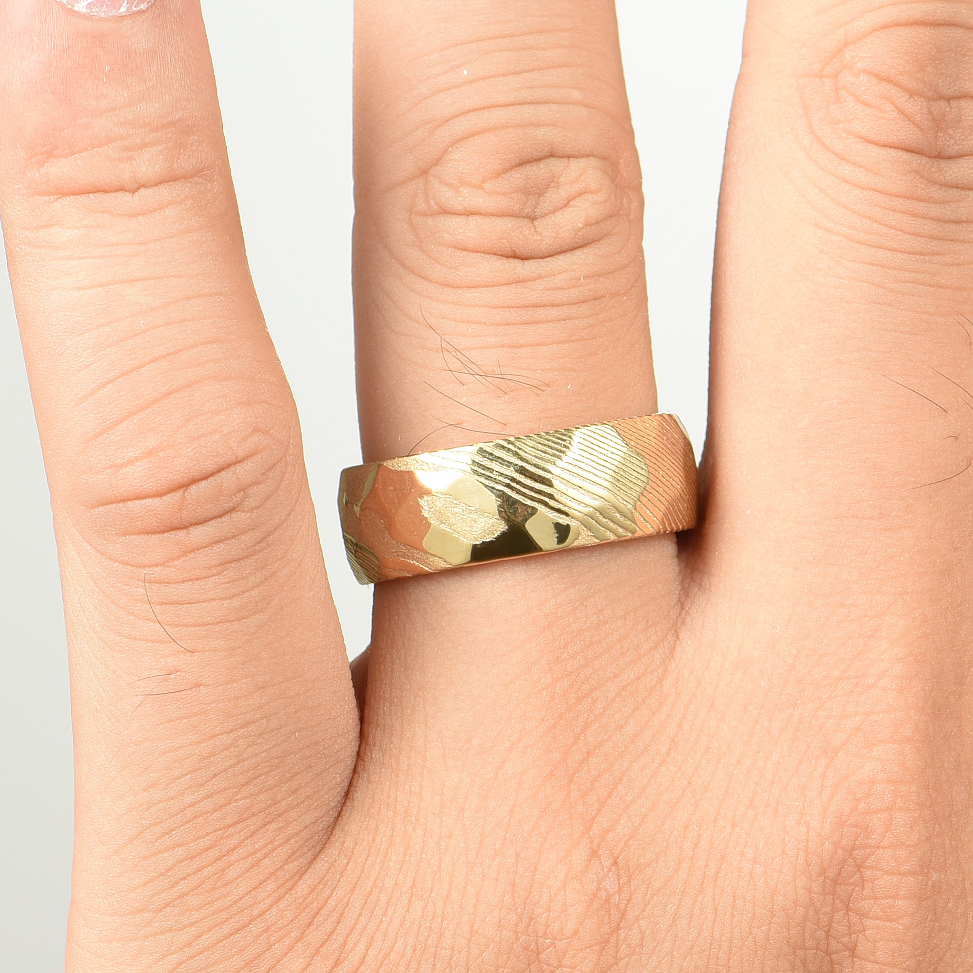 Wedding Gold Band Damascus Hand View