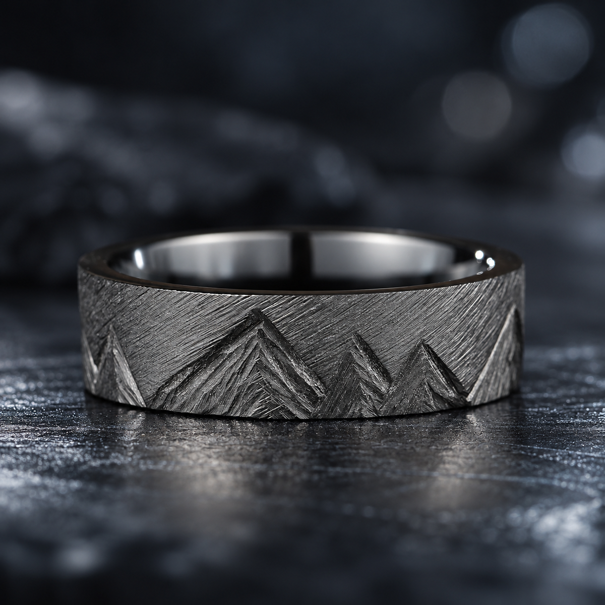 Zirconium ring for men with a distinctive carved mountain range design